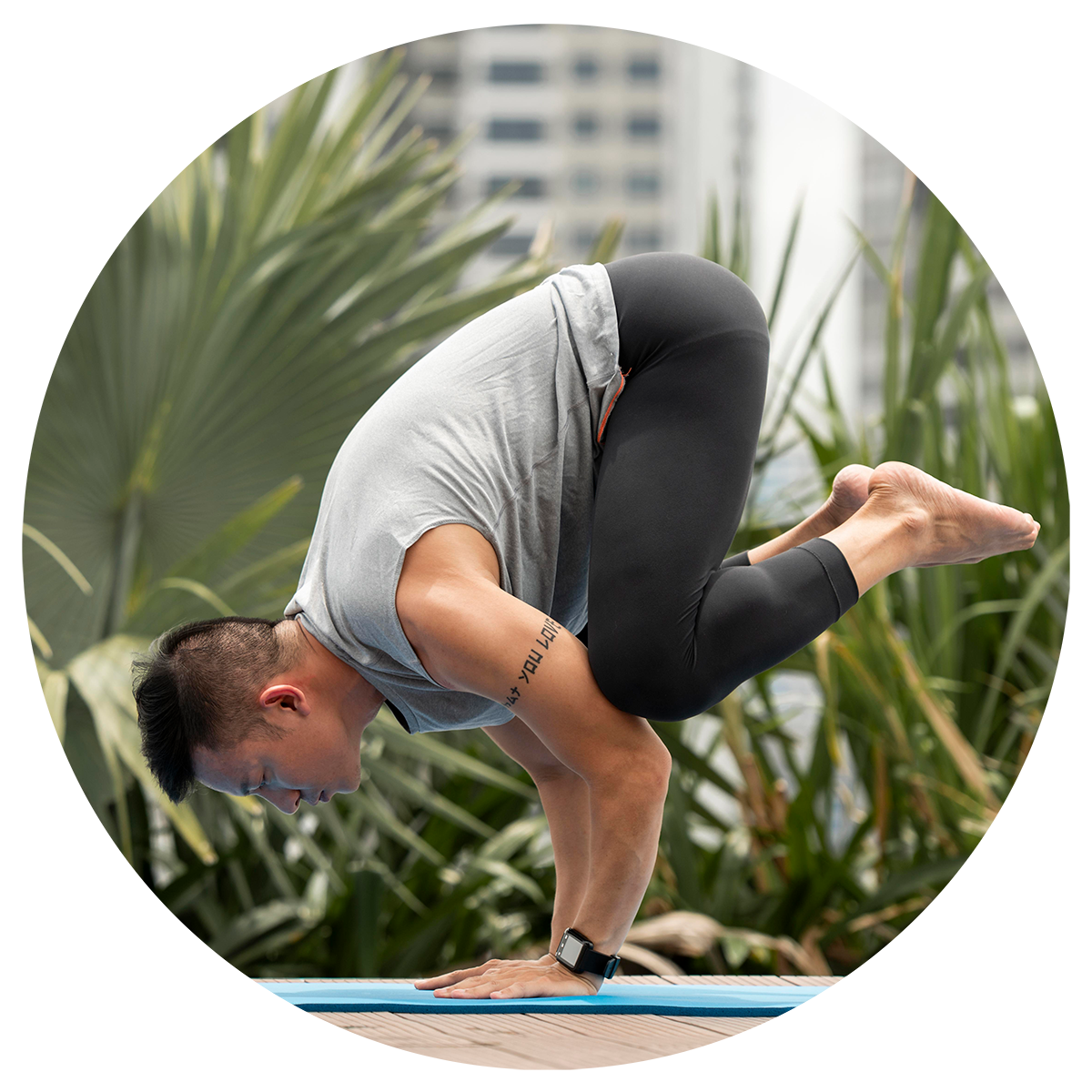 man-practicing-yoga-position-outside