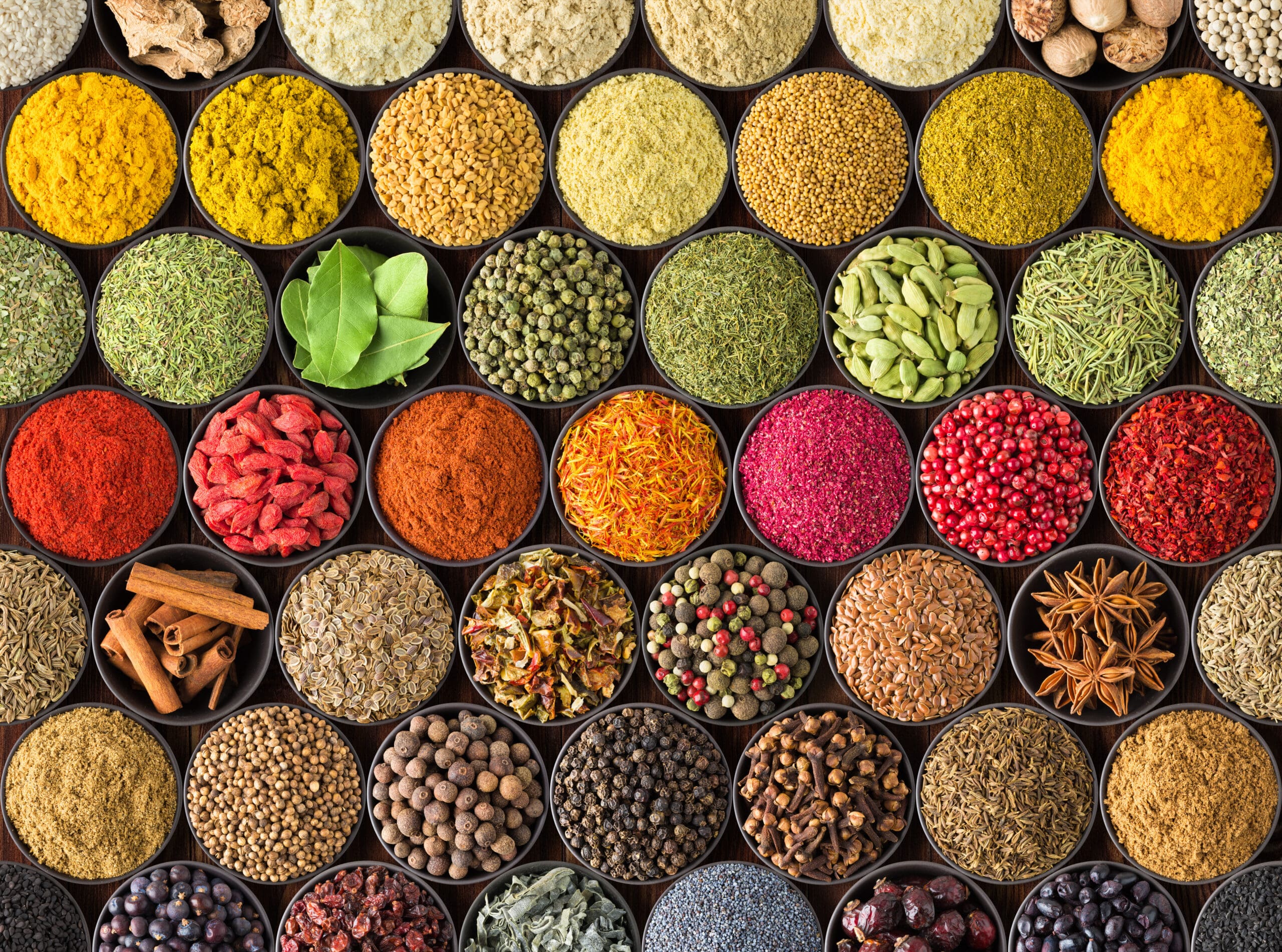 Bright spice background, top view. Collection  seasoning and herbs of Indian food